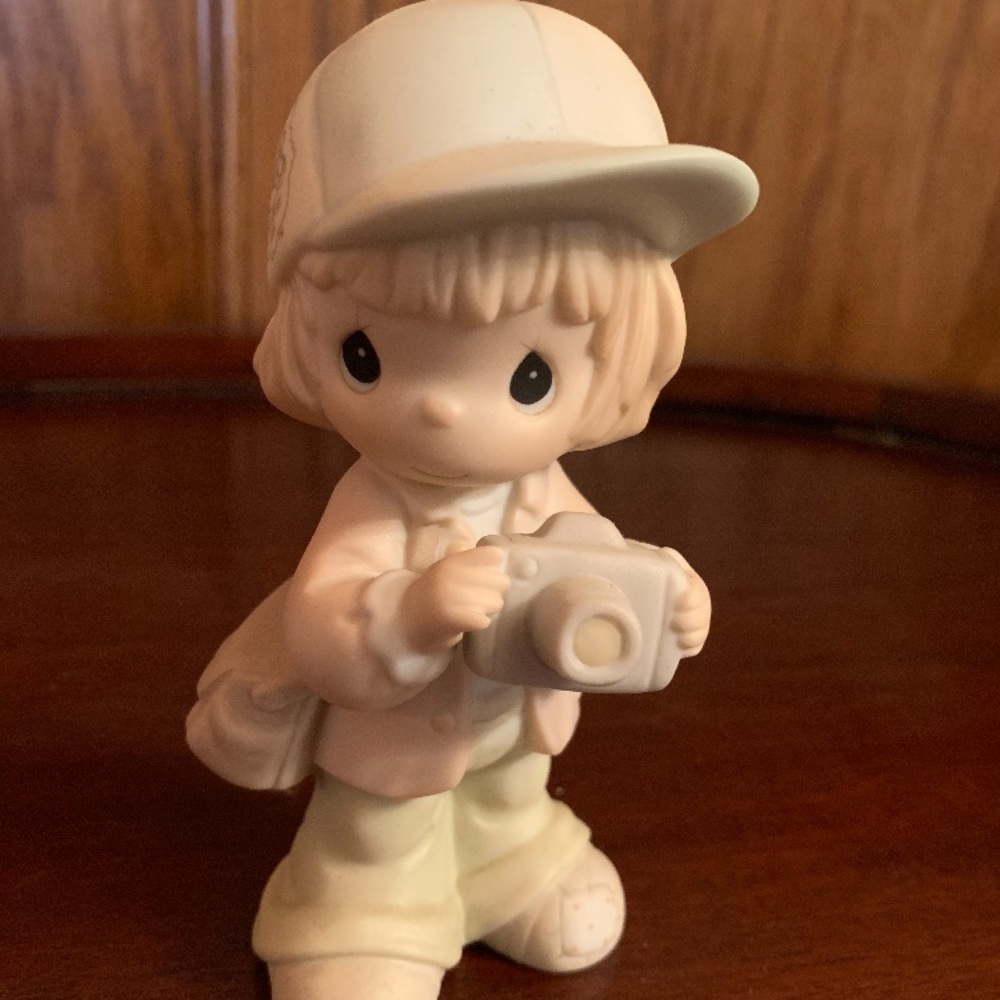 Like new precious moments statue Boy with camera